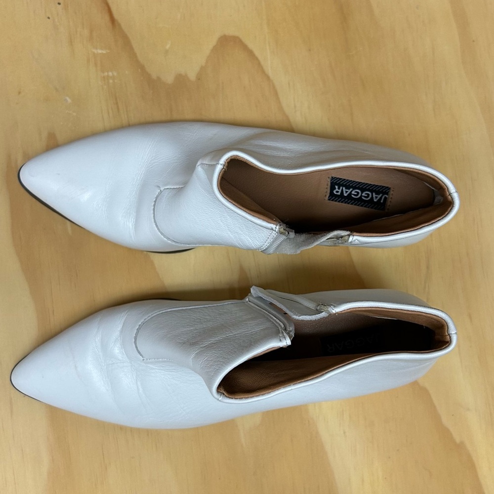 White leather ankle boots with pointed toe